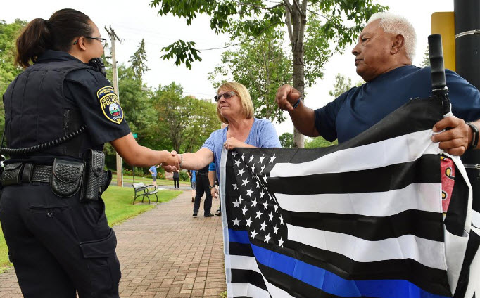 Shaking hands with the police